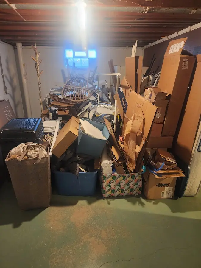 Roll-off dumpster container at job site for 15 Yard Dumpster Rental in Forest Acres